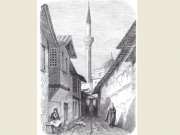 «Δρόμος στη Λάρισα». Πιθανολογείται ότι είναι η σημερινή οδός Παπαφλέσσα και στο βάθος το Μπαϊρακλί τζαμί. Εφ. L’ Illustration Journal Universel, αρ. 459, Paris, 13 Δεκεμβρίου 1851, σελ. 376. Αρχείο Φωτοθήκης Λάρισας