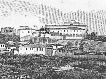 Η Βασιλική του Αγίου Αχιλλίου στον λόφο. Το κτίριο με τις καμάρες ήταν το Επισκοπείο όπου κατοικούσε ο μητροπολίτης Γαβριήλ Β΄ Γκάγκας (1806-1810). Λεπτομέρεια από χαρακτικό του 1897